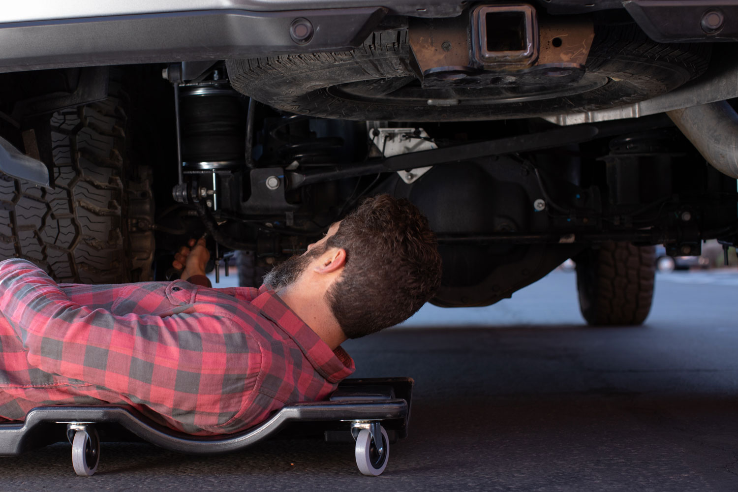 Man installing air spring