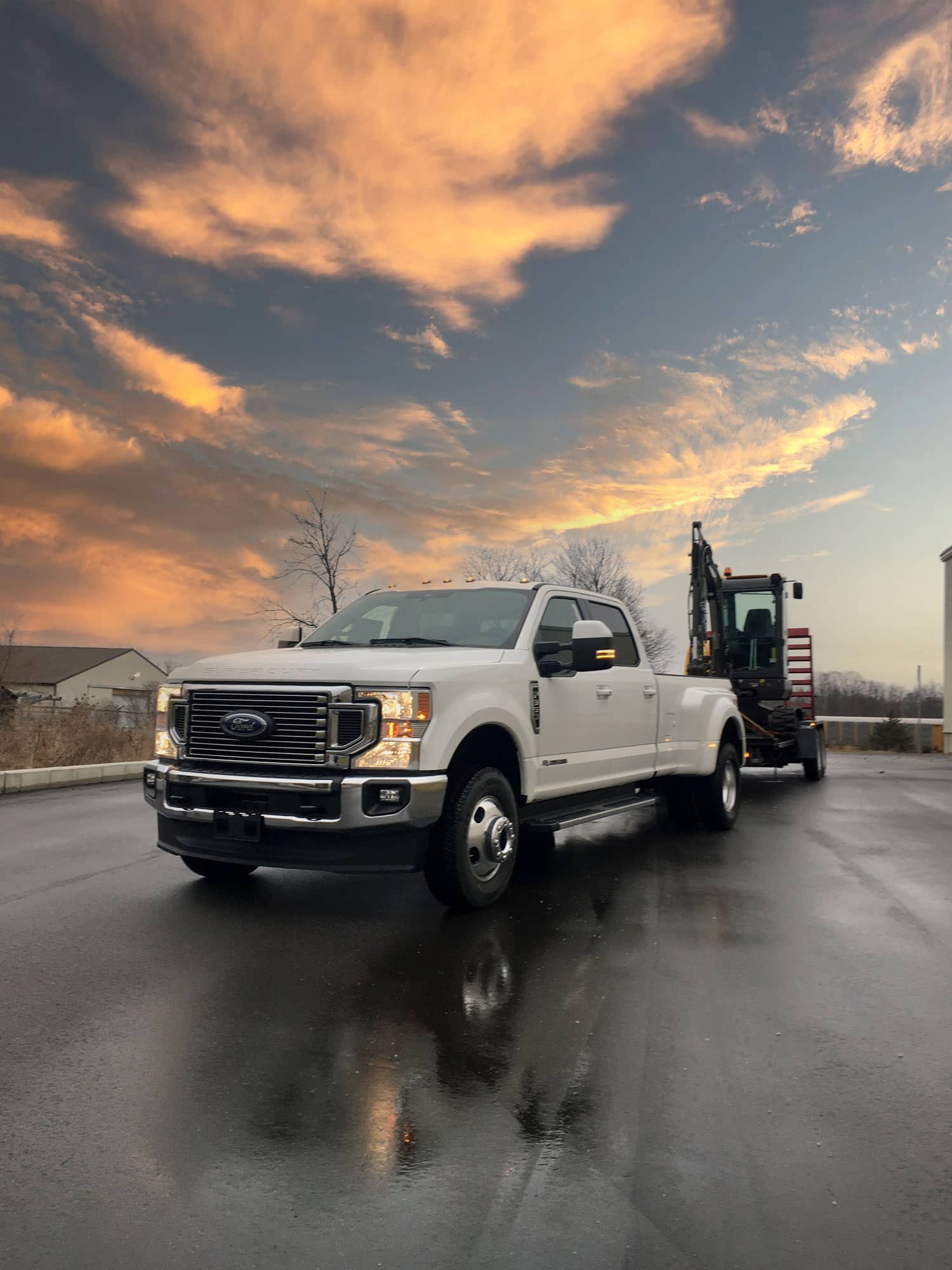 Truck hauling heavy equipment